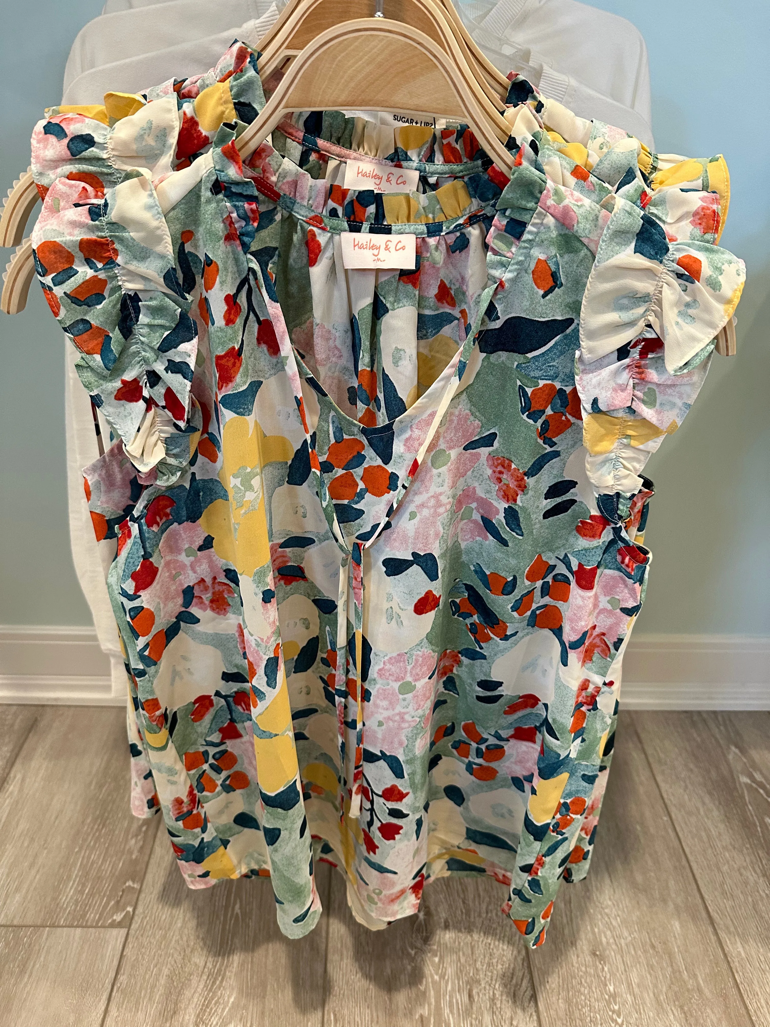 Spring Forward Ruffle Cap Sleeve Blouse